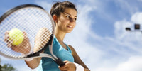 girl playing tennis