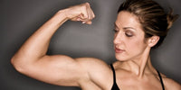 woman flexing muscle